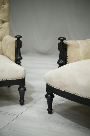 Pair of Napoleon III Buttoned armchairs with ebonised frame