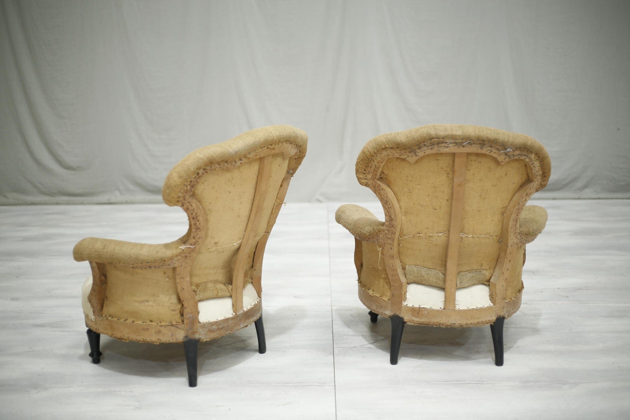 Pair of Napoleon III unusual shaped armchairs