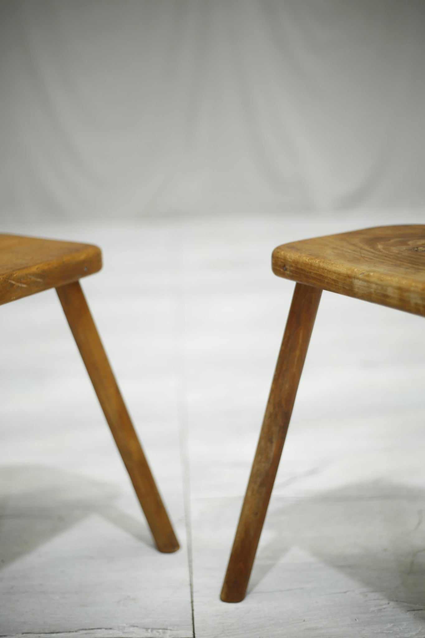 Pair of 20th century French elm country stools No1