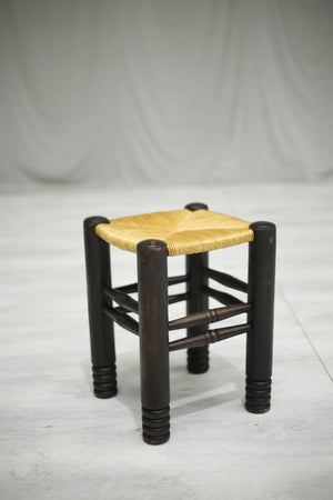 Mid century French ebonised and rush seated stool