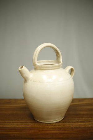 Early 20th century French cream glazed jug