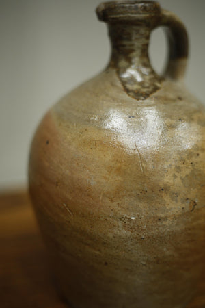 Early 20th century Nut oil jug No1