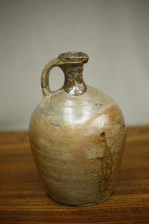 Early 20th century Nut oil jug No1
