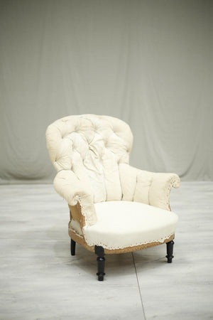 Antique Napoleon III Buttoned curve back armchair