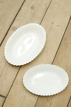 Two vintage white porcelain oval serving plates