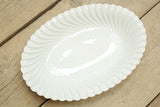 Two vintage white porcelain oval serving plates