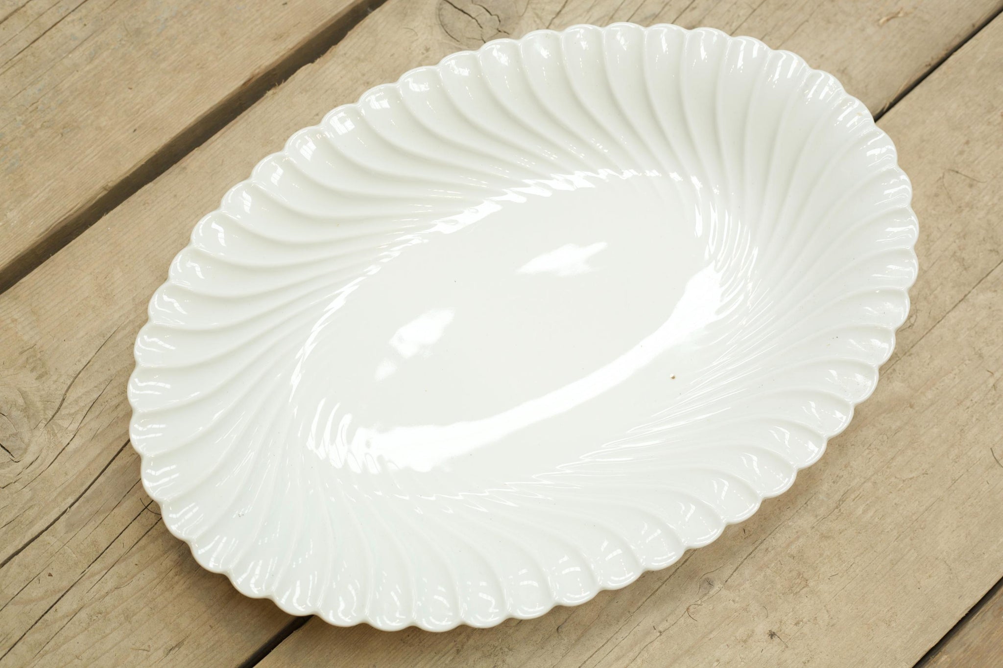 Two vintage white porcelain oval serving plates