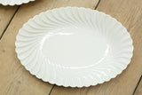 Two vintage white porcelain oval serving plates