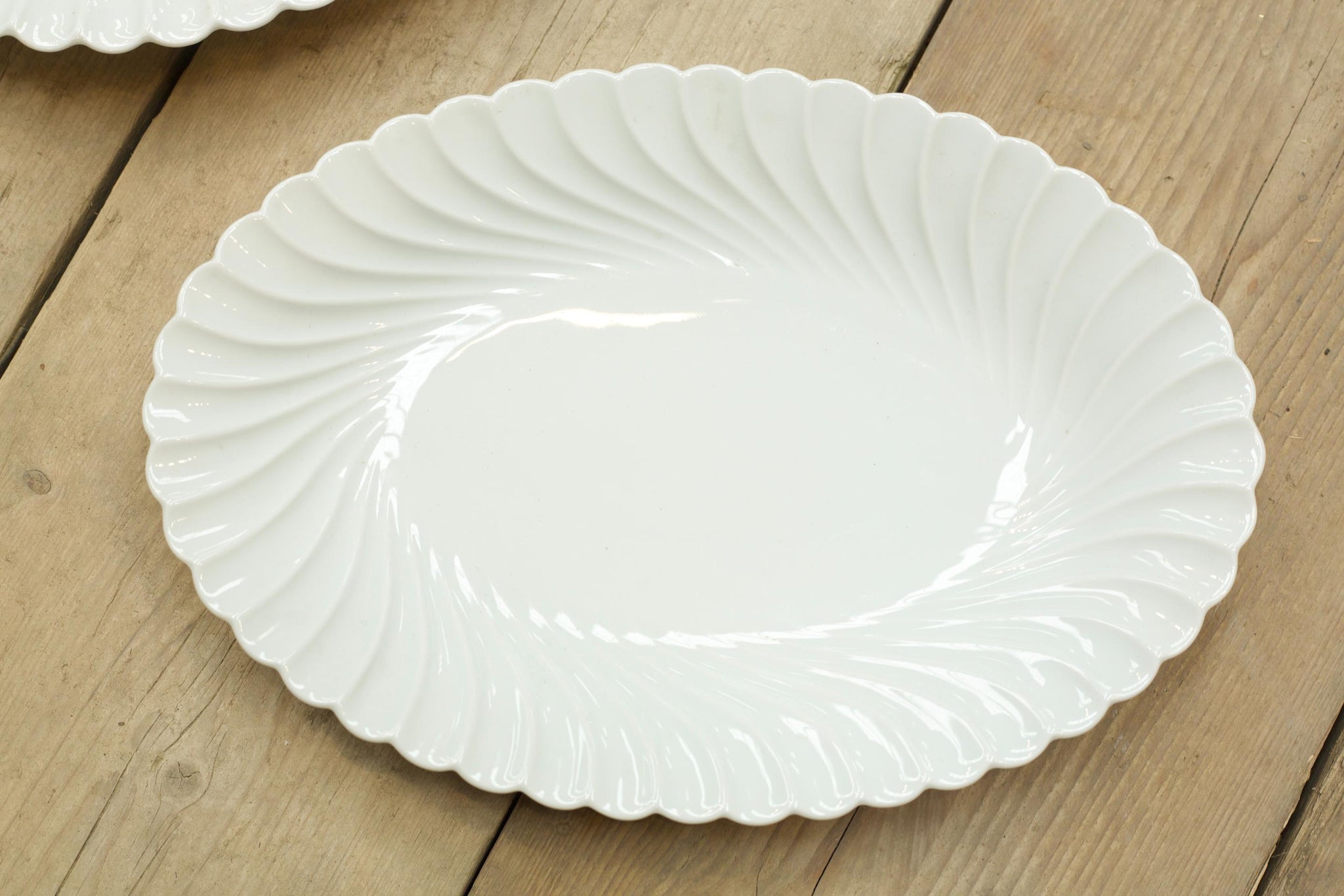 Two vintage white porcelain oval serving plates