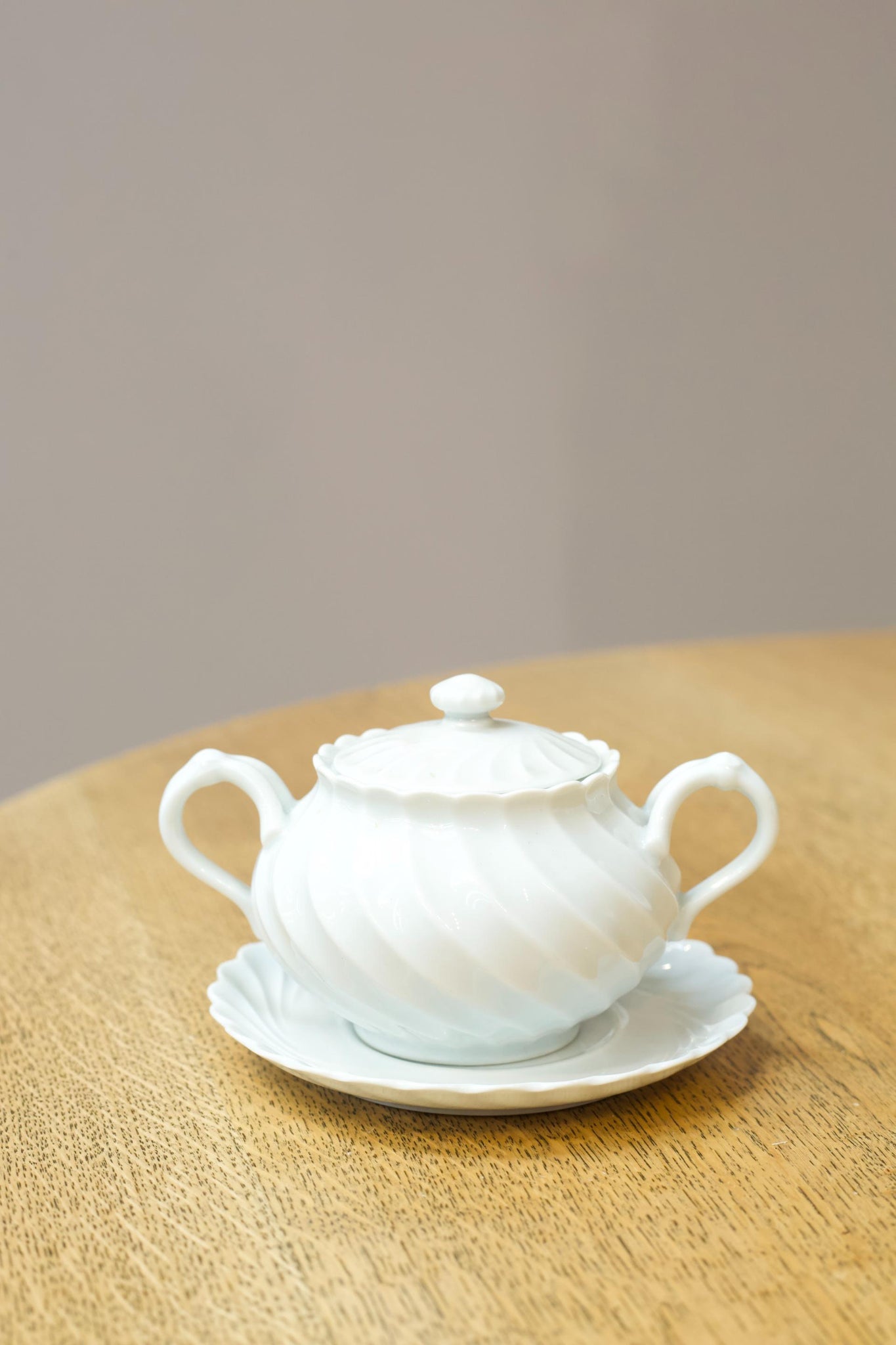 Vintage white porcelain sugar bowl and saucer