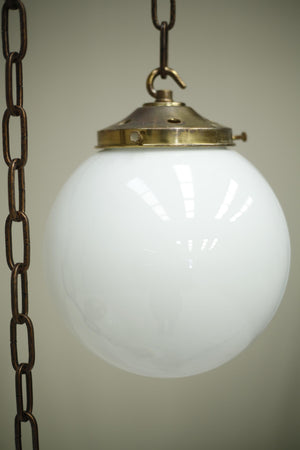 Huge run of 20th century small opaline globe pendant lights