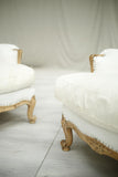 Pair of 20th century pale wood framed French armchairs