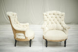 Pair of Napoleon III buttoned shield back armchairs