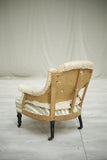 Single Napoleon III buttoned shield back armchair