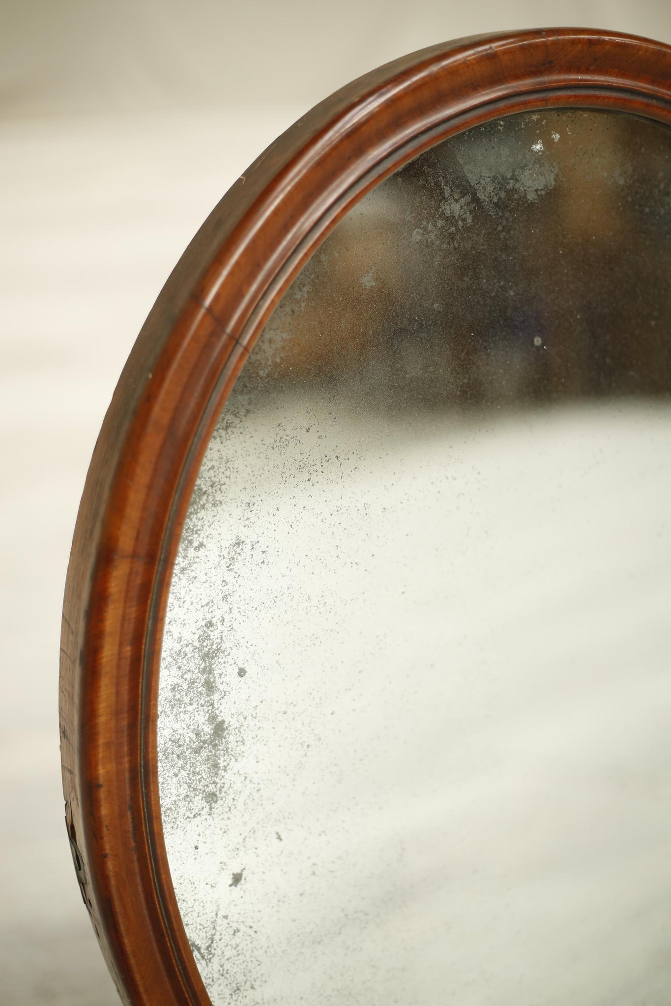 Antique 19th century Oval mahogany wall mirror
