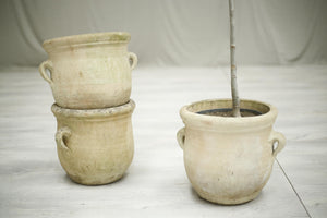 Vintage trio of terracotta olive pots