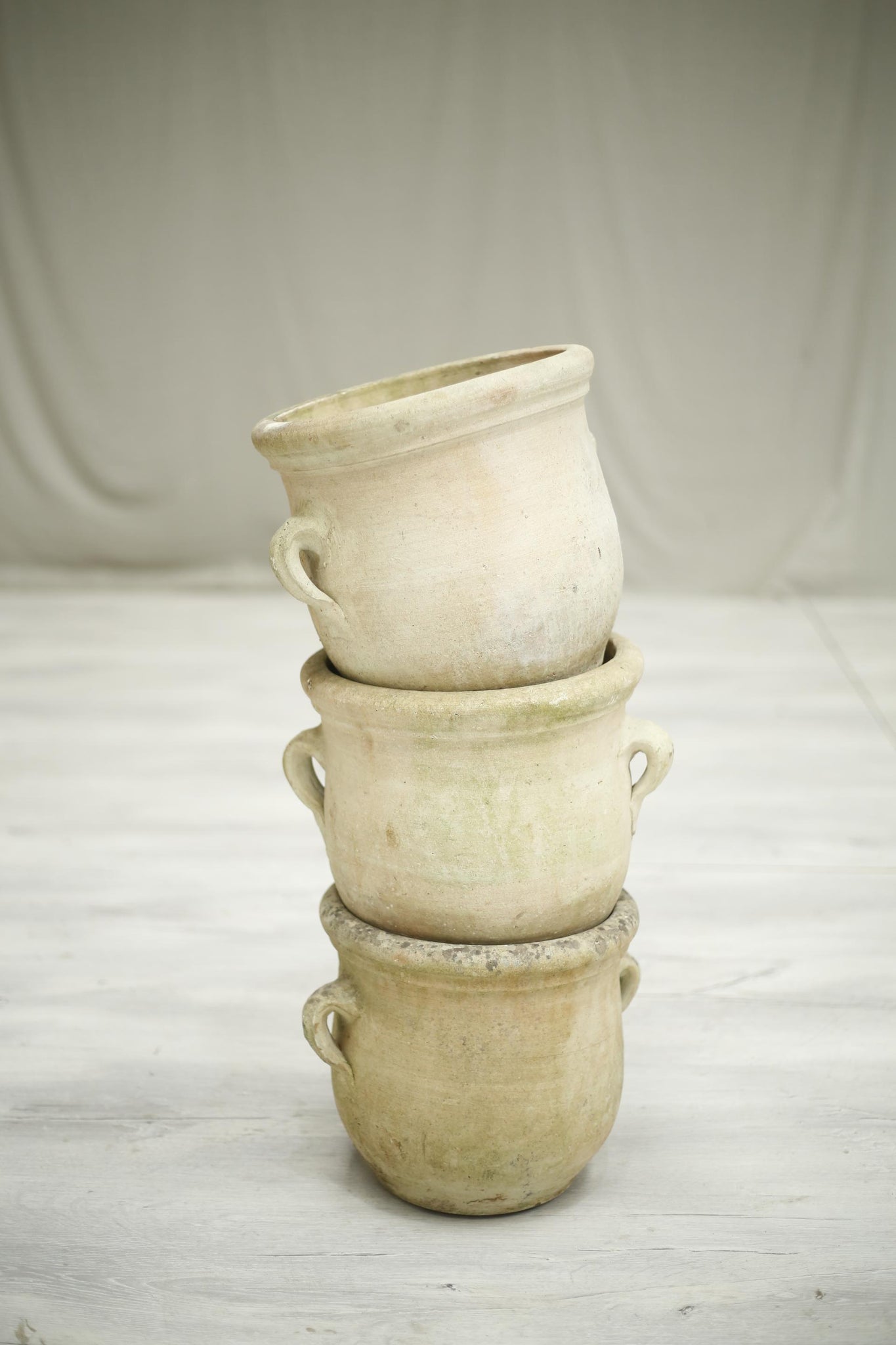 Vintage trio of terracotta olive pots