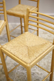 4x Mid century blonde wood and rush seated bar stools - TallBoy Interiors