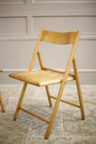 Pair of mid century blonde wood folding chairs - TallBoy Interiors