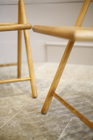 Pair of mid century blonde wood folding chairs - TallBoy Interiors